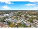 Aerial view of a waterfront community with single-Gathering homes at 8 Citrus Dr, Palm Harbor, FL 34684