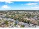 Aerial view showing the neighborhood's layout and proximity to the water at 8 Citrus Dr, Palm Harbor, FL 34684