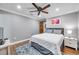 Bright bedroom with a queen bed and hardwood floors at 8 Citrus Dr, Palm Harbor, FL 34684