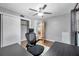 Home office with wood flooring, ceiling fan and large window at 8 Citrus Dr, Palm Harbor, FL 34684