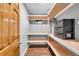 Large closet with built-in shelving and hanging rods at 8 Citrus Dr, Palm Harbor, FL 34684