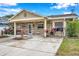 Charming one-story house with stone exterior and a spacious driveway at 8 Citrus Dr, Palm Harbor, FL 34684