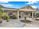 One-story house with stone exterior, covered porch, and well-manicured yard at 8 Citrus Dr, Palm Harbor, FL 34684