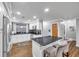 Modern kitchen with granite island and stainless steel appliances at 8 Citrus Dr, Palm Harbor, FL 34684