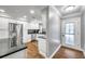Modern kitchen with white cabinets, stainless steel appliances, and granite countertops at 8 Citrus Dr, Palm Harbor, FL 34684
