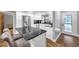 Modern kitchen with stainless steel appliances and granite island at 8 Citrus Dr, Palm Harbor, FL 34684