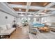 Open living area with wood ceiling and comfortable seating at 8 Citrus Dr, Palm Harbor, FL 34684