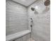 Walk-in shower with multiple shower heads and tiled seat at 8 Citrus Dr, Palm Harbor, FL 34684
