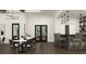 Modern community bar and lounge area with seating at 9650 Minnow Ray Dr, Land O Lakes, FL 34638