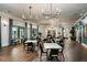 Bright and airy community room with multiple seating areas at 9650 Minnow Ray Dr, Land O Lakes, FL 34638