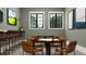 Community game room with bar, seating, and poker table at 9650 Minnow Ray Dr, Land O Lakes, FL 34638