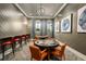 Modern game room with stylish seating and game table at 9650 Minnow Ray Dr, Land O Lakes, FL 34638