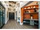Elegant lobby with hardwood floors and built-in workspace at 9650 Minnow Ray Dr, Land O Lakes, FL 34638