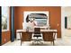 Home office with a large desk and an abstract painting at 9650 Minnow Ray Dr, Land O Lakes, FL 34638