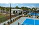 Community pickleball courts and nearby clubhouse at 9650 Minnow Ray Dr, Land O Lakes, FL 34638