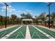 Well-maintained shuffleboard courts with covered seating at 9650 Minnow Ray Dr, Land O Lakes, FL 34638