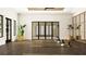Serene yoga studio featuring hardwood floors and large mirrors at 9650 Minnow Ray Dr, Land O Lakes, FL 34638