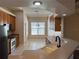 View of kitchen with breakfast nook and modern cabinetry at 11321 Flora Springs Dr, Riverview, FL 33579