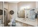 Clean bathroom with a shower/tub combo, vanity, and toilet at 1141 Jameson Greens Dr # 3, Sun City Center, FL 33573