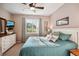 Spacious bedroom with a king-size bed and plenty of natural light at 1141 Jameson Greens Dr # 3, Sun City Center, FL 33573
