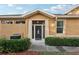 Front entrance with a decorative screen door at 1141 Jameson Greens Dr # 3, Sun City Center, FL 33573