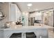 Modern kitchen with white cabinets and stainless steel appliances at 1141 Jameson Greens Dr # 3, Sun City Center, FL 33573