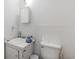 Small bathroom with toilet and sink at 14035 21St St, Dade City, FL 33525