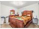 Bedroom with wooden bed frame and dresser at 14035 21St St, Dade City, FL 33525