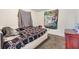 Small bedroom with double bed, carpet, and tiger tapestry at 14035 21St St, Dade City, FL 33525