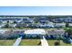Aerial view of neighborhood with single-Gathering homes at 1518 Chevy Chase Dr, Sun City Center, FL 33573