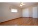 Bright bedroom with laminate flooring and double closets at 1518 Chevy Chase Dr, Sun City Center, FL 33573