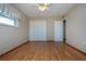 Spacious bedroom with ample closet space and wood flooring at 1518 Chevy Chase Dr, Sun City Center, FL 33573