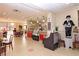 Bright and inviting community cafe with seating and display cases at 1518 Chevy Chase Dr, Sun City Center, FL 33573