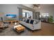 Spacious living room with wood floors and modern decor at 1518 Chevy Chase Dr, Sun City Center, FL 33573