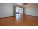 Spacious living room with laminate wood flooring at 1518 Chevy Chase Dr, Sun City Center, FL 33573