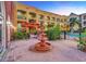 Community courtyard with fountain and brick-paved walkways at 1810 E Palm Ave # 5113, Tampa, FL 33605