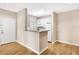 Efficient kitchen with granite countertops and white cabinets at 1810 E Palm Ave # 5113, Tampa, FL 33605