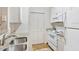 Kitchen with granite countertops, sink, and appliances at 1810 E Palm Ave # 5113, Tampa, FL 33605