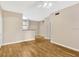 Open living area with wood flooring and kitchen bar at 1810 E Palm Ave # 5113, Tampa, FL 33605