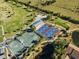 Aerial view showing tennis courts, pickleball courts, and a clubhouse at 2825 Terra Ceia Bay Blvd # 1902, Palmetto, FL 34221