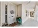 Inviting condo entry with decorative wreath and plant at 2825 Terra Ceia Bay Blvd # 1902, Palmetto, FL 34221