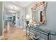 Elegant entryway with seashell mirror and glass-top console table at 2825 Terra Ceia Bay Blvd # 1902, Palmetto, FL 34221