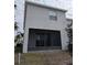 Spacious screened porch provides extra outdoor living space at 3005 Suncoast Blend Dr, Odessa, FL 33556