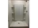 Large walk-in shower with built-in shelving at 3005 Suncoast Blend Dr, Odessa, FL 33556