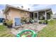 Landscaped backyard with patio and sandbox at 3411 28Th E St, Bradenton, FL 34208