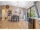 Spacious dining area with wood floors, and access to backyard at 3411 28Th E St, Bradenton, FL 34208