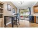 Bright dining area with table and chairs, and view of backyard at 3411 28Th E St, Bradenton, FL 34208
