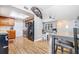 Open kitchen boasts stainless steel appliances and wood flooring at 3411 28Th E St, Bradenton, FL 34208