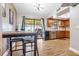 Kitchen with wood cabinets and access to backyard at 3411 28Th E St, Bradenton, FL 34208