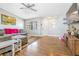 Living area featuring a sectional sofa and wood floors at 3411 28Th E St, Bradenton, FL 34208